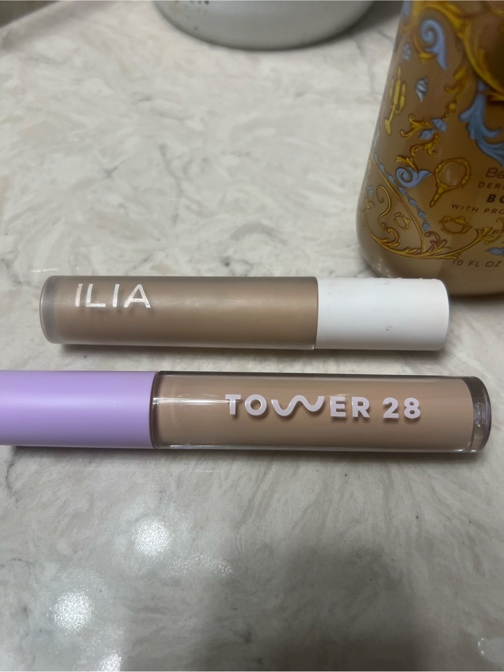 Tower 28 Concealer in Light Beige with Lavender Cap